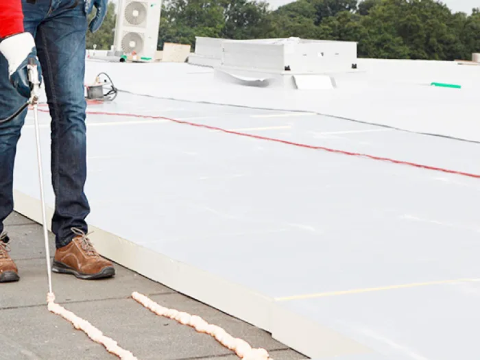 Bonding on roof surfaces